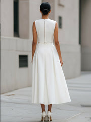 Sleeveless Cropped Top And Pleated Midi Skirt Set