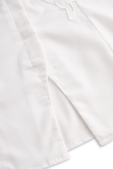 Sleeveless Shirt with 3D Floral Appliqué