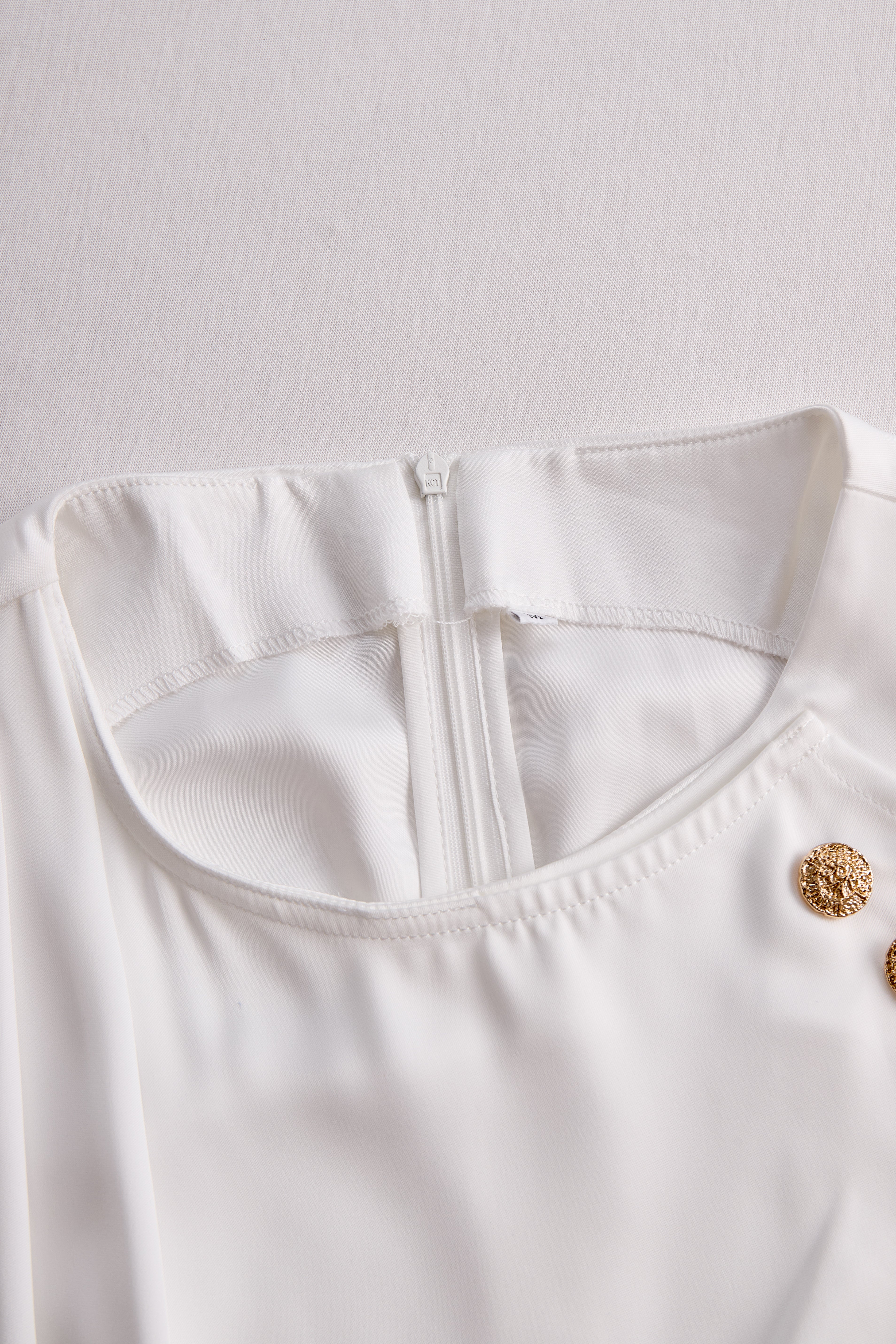 Elegant White Draped Top with Button Detail